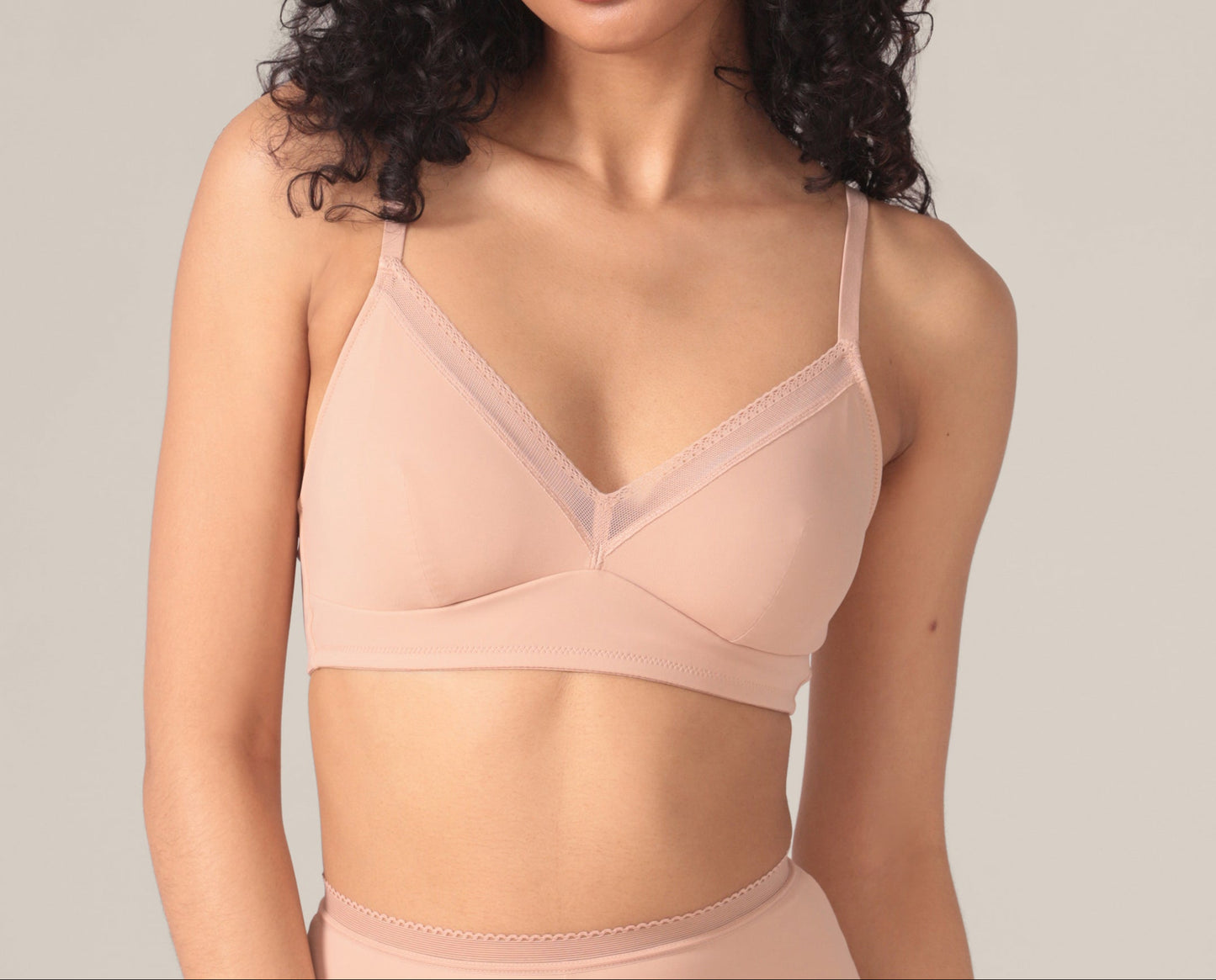 Woman wearing a beige bra 