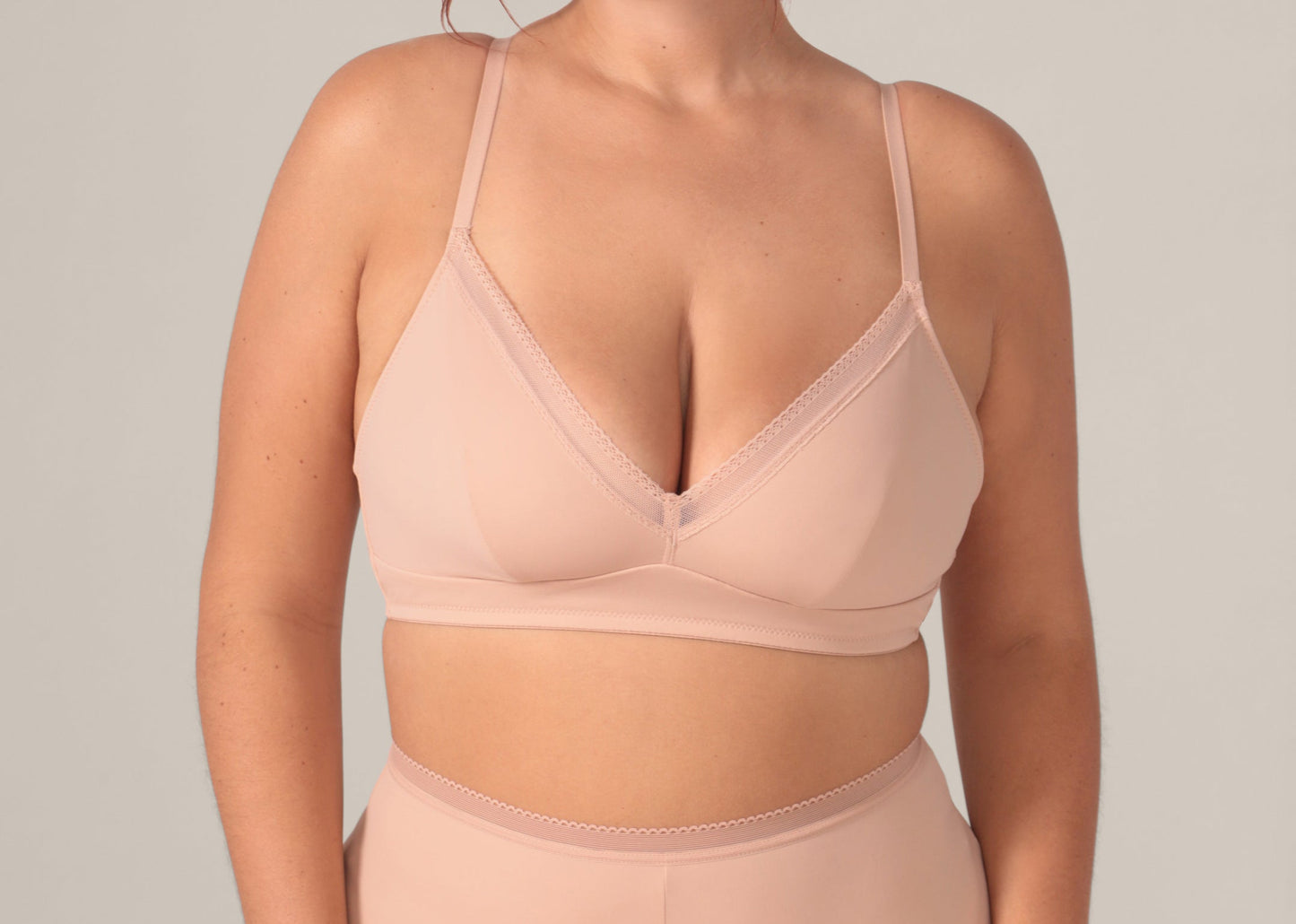 Woman wearing a beige bra 