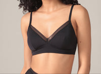 Woman wearing a black bra